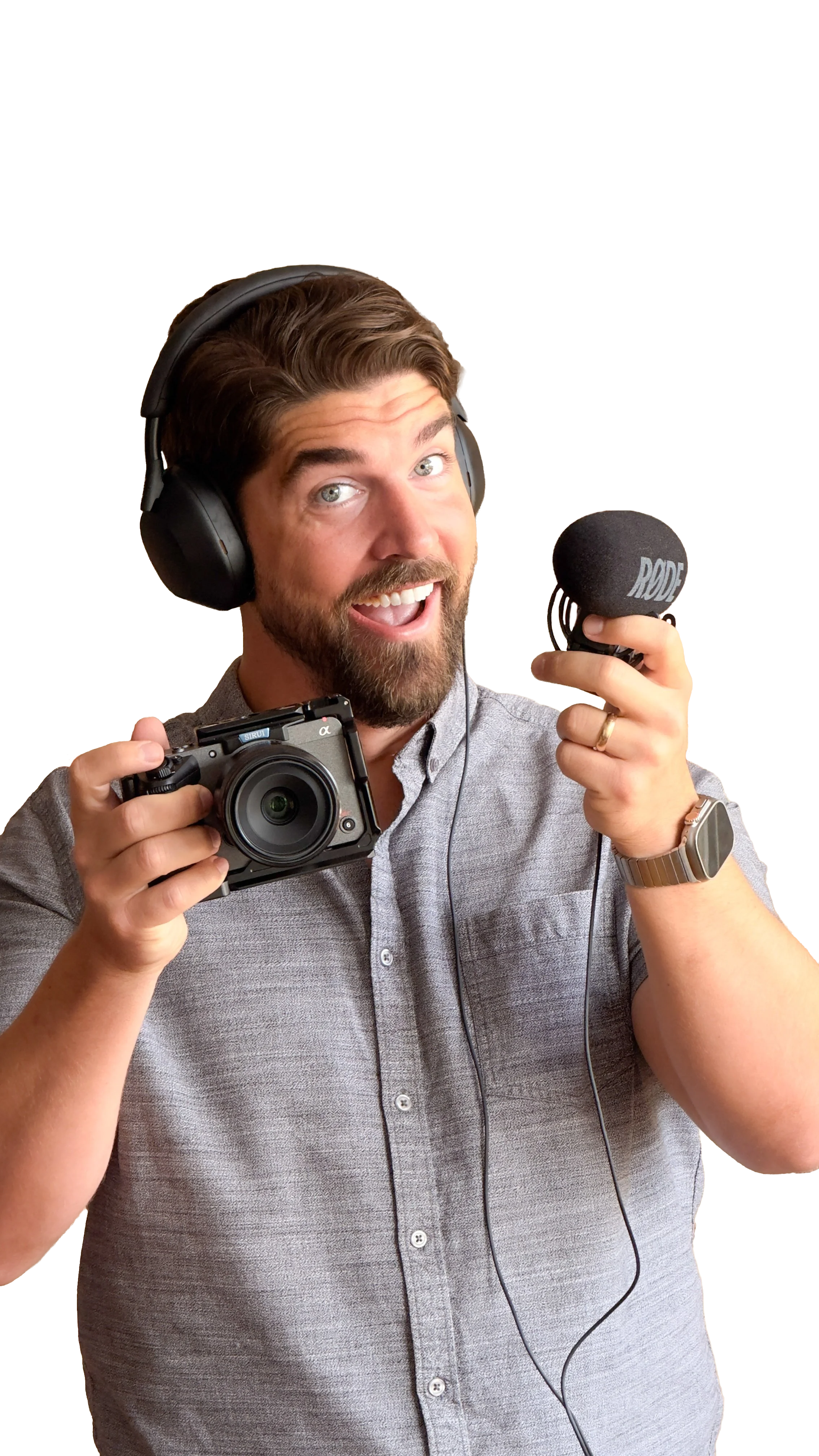 Mark Harvey, Owner and Creative Director of Origin Socials, holding a Sony camera and RODE microphone